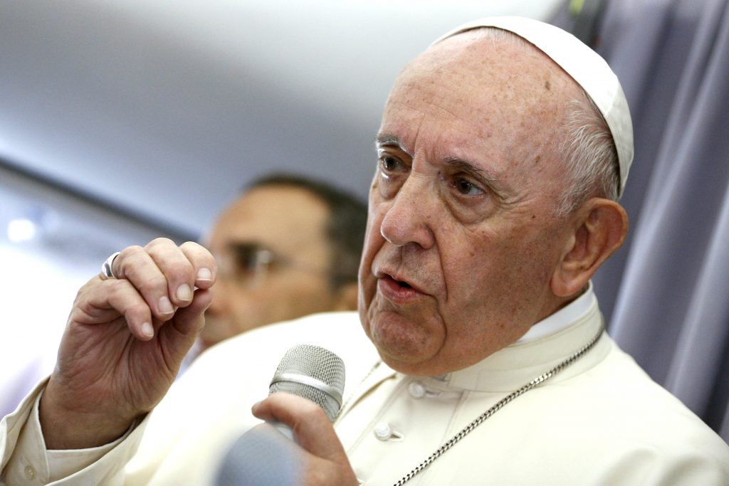 Pope Francis answers questions from journalists aboard his flight from Sibiu, Romania, to Rome on 2 June 2019. Photo: Paul Haring/CNS.