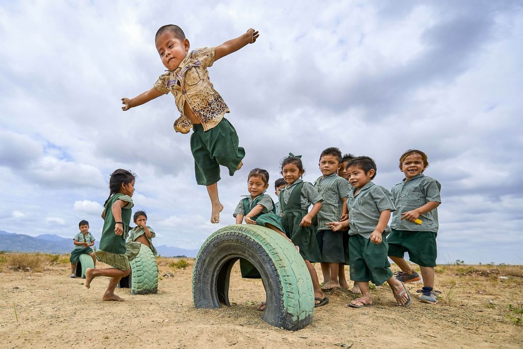 Children practice flying during school recess in Hiowa, Guyana on 4 April 2019. The Vatican was to release the working document for the Synod of Bishops for the Amazon on 17 June. Photo: Paul Jeffrey/CNS.