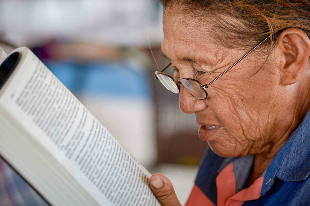 A woman reads the Bible during a workshop in St Ignatius, Guyana on 5 April 2019. The workshop was to help laypeople improve their reading of the Sunday Scriptures in their own languages, so they can better lead liturgies in their own indigenous communities. Photo: Paul Jeffrey/CNS.