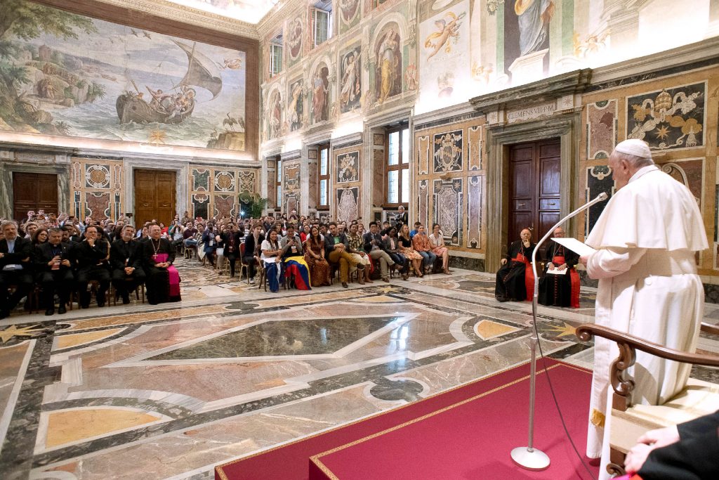 Pope Francis meets with participants attending the post-synod Youth Forum during an audience at the Vatican on 22 June. Photo: Vatican Media/CNS.