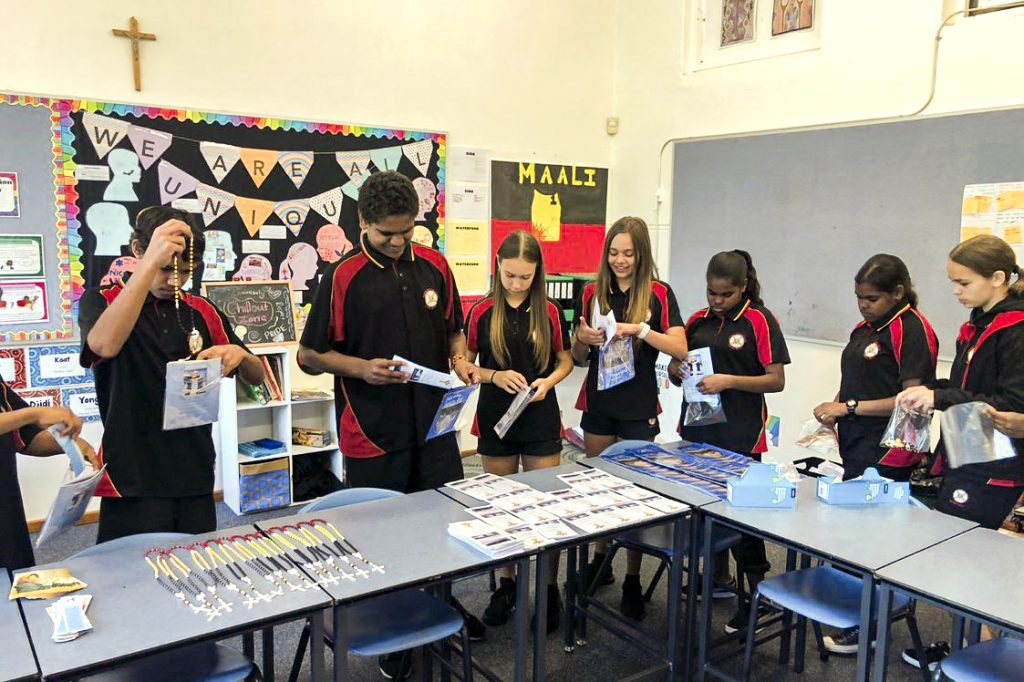 Year 7 students making hospital packs, as part of their Christian Service Learning, for Aboriginal Catholic Ministry. Photo: Supplied.
