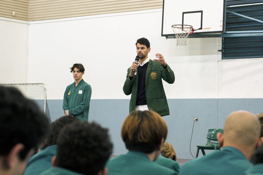 Chisholm College student Alex Myint speaks to fellow students, having professionally competed in last year’s Youth Olympic Games in the sport of Roller Speed Skating. Photo: Supplied.