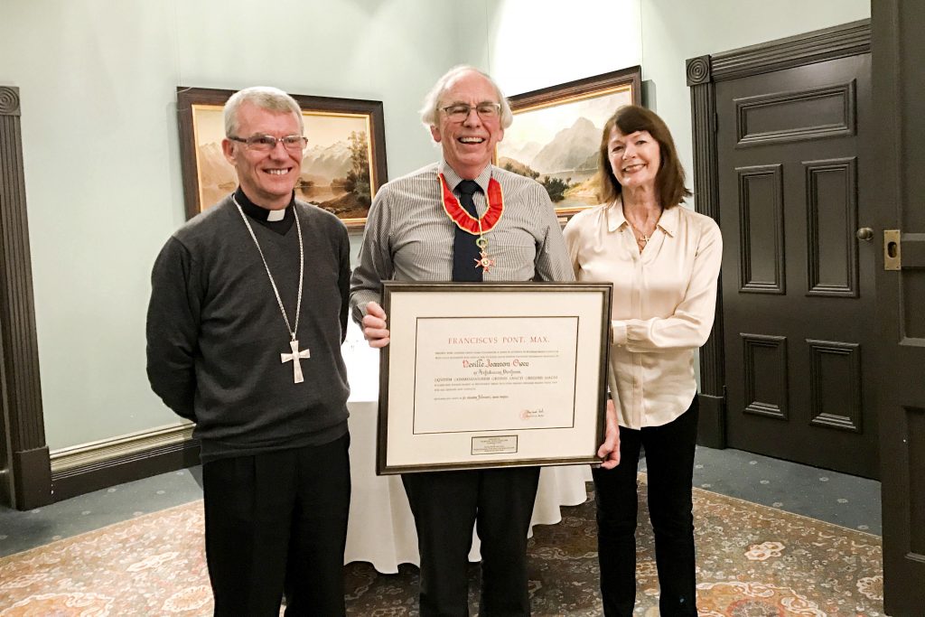 Perth Archbishop Timothy Costelloe SDB presents Justice Neville Owen with a Papal Honour of the Knight Commander of the Order of St Gregory the Great on behalf of His Holiness Pope Francis in June 2018. Photo: Supplied.