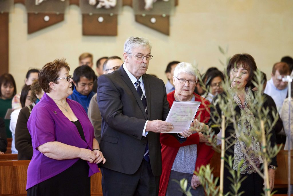 Centre for Liturgy Director Sr Kerry Willison RSM with Cathedral parishioners Don Hegarty, Kath Jacques, and Lolita Hegarty during Mass at St Mary’s Cathedral, Sunday 2 June, marking the launch of the second phase of the 2020 Plenary Council. Photo: Ron Tan.
