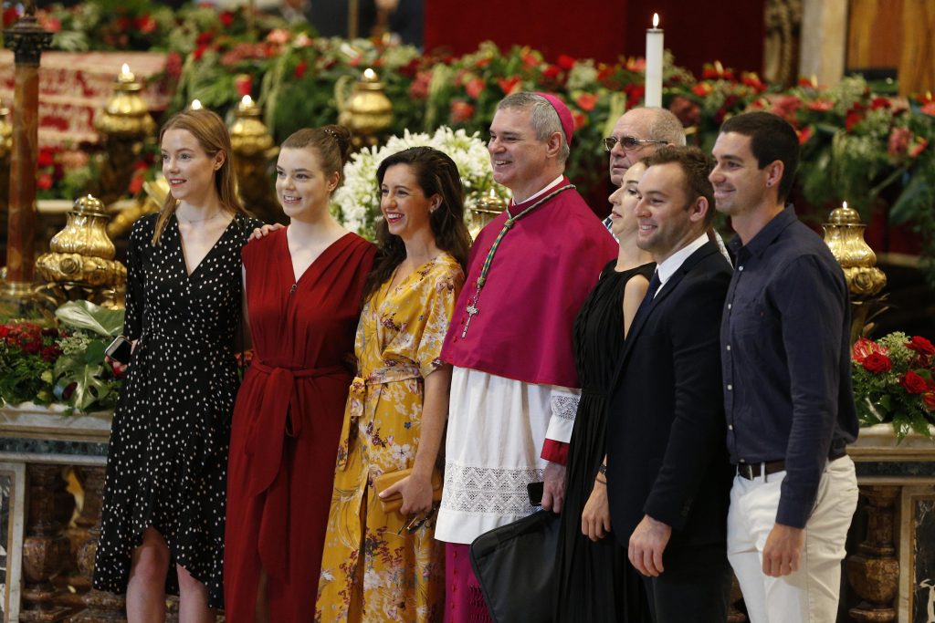 Melbourne Archbishop Peter Comensoli poses for a photo with family members before Pope Francis' celebration of Mass marking the feast of Sts Peter and Paul in St Peter's Basilica at the Vatican on 29 June 2019. Archbishop Comensoli was among the new archbishops who received a pallium from the Pope. Photo: Paul Haring/CNS.