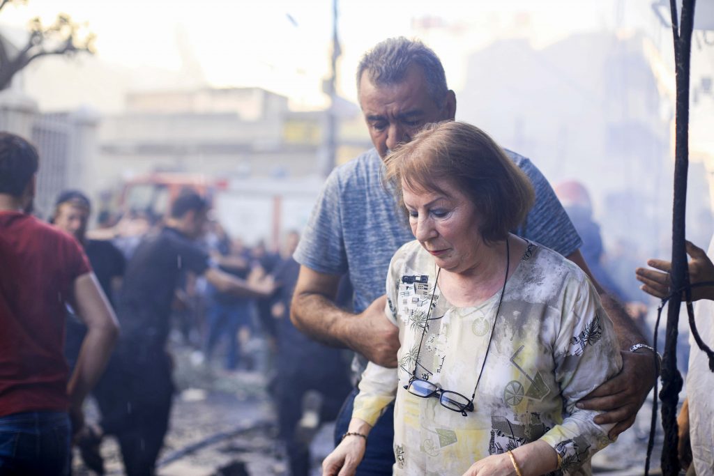 At least 11 people were injured in the blast during evening services. It was unclear who was responsible for the attack. Photo: Rodi Said/Reuters.
