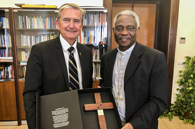 Chris Ellison with His Eminence Cardinal Peter Turkson (Prefect of the Dicastery for Promoting Integral Human Development. Photo: Supplied.