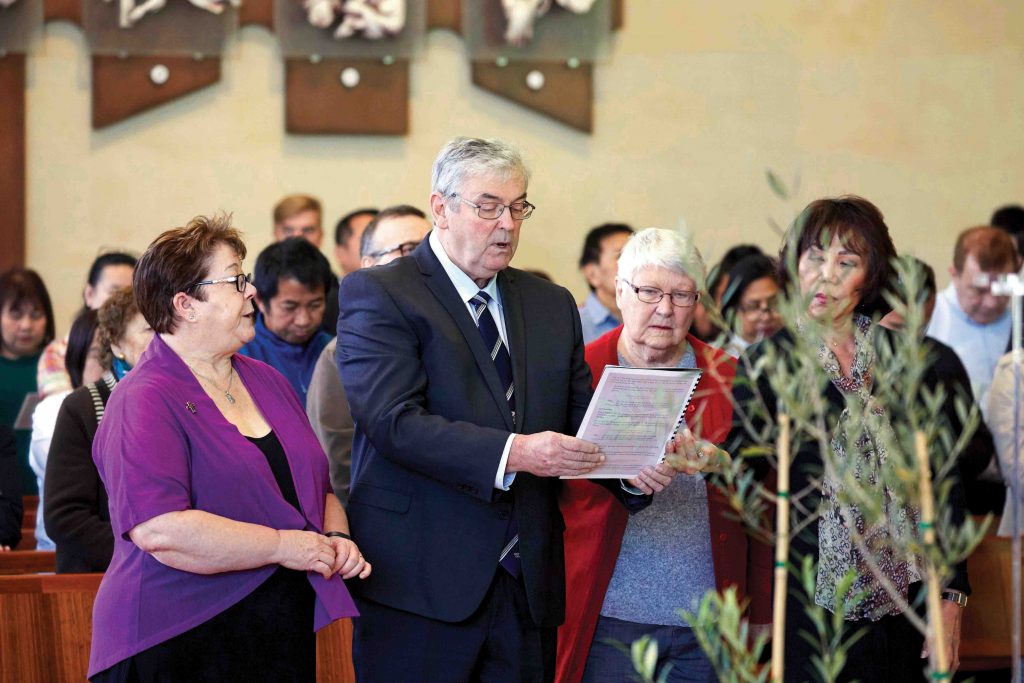 Centre for Liturgy Director Sr Kerry Willison RSM with Cathedral parishioners Don Hegarty, Kath Jacques, and Lolita Hegarty during Mass at St Mary’s Cathedral, Sunday 2 June, marking the launch of the second phase of the 2020 Plenary Council. Photo: Ron Tan.
