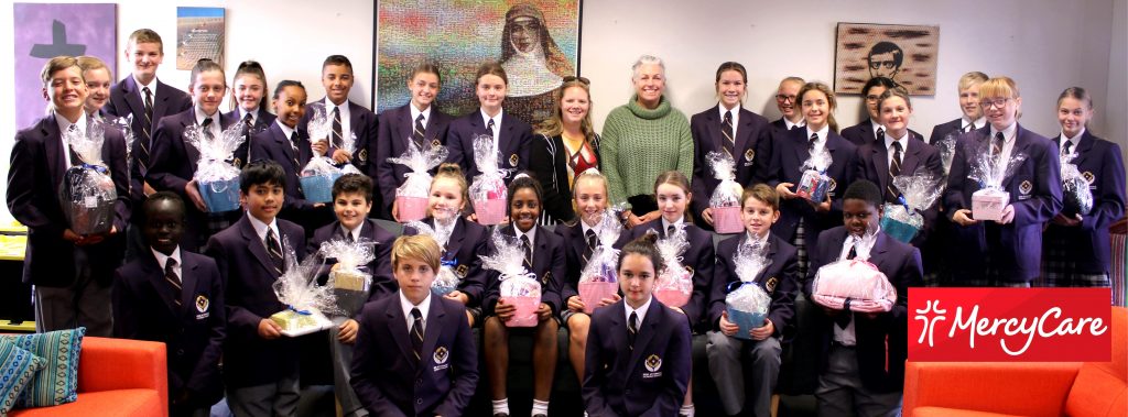 Mrs Louise Mason, Irene McCormack School Liaison Officer and Mrs Janice Bell Service Learning Coordinator with the Year 7 Evans House Students. Photo: Supplied.