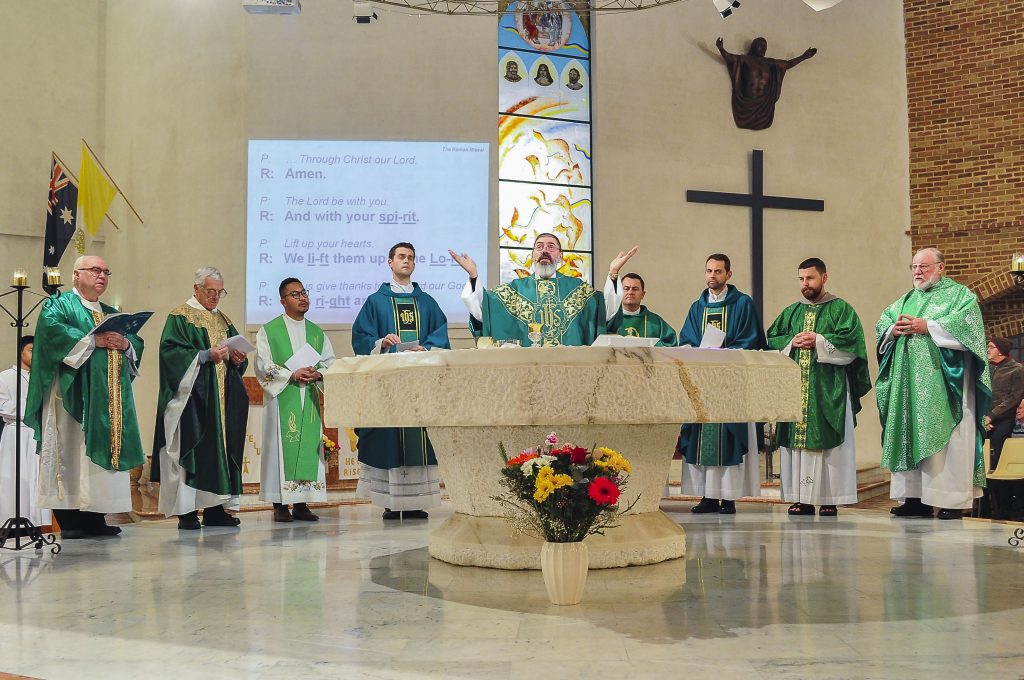 Fr Mark Rucci celebrates Thanksgiving Mass at Ballajura Parish with (from left): Fr Patrick Toohey, Fr Peter Bianchini, Fr Israel Quirit, Fr Stephen Gorddard, Fr John Jegorow (Parish Priest), Fr Brendan Gormley, Fr Grant Gorddard, and Fr Benedict Mackenzie FSF on Saturday 17 August 2019. Photo: Supplied.