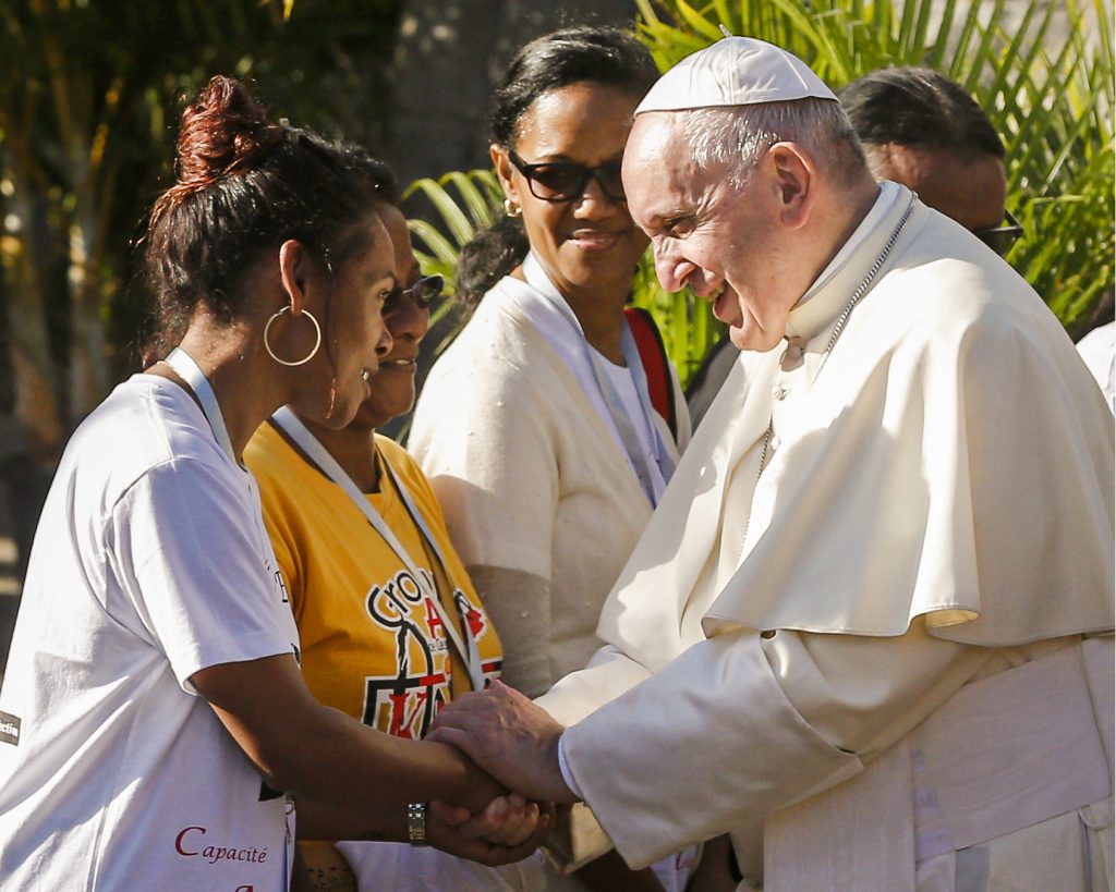 Pope Francis urged the local church and government to make greater efforts to listen to and involve the island's young people in every aspect of life. Photo: Paul Haring/CNS.