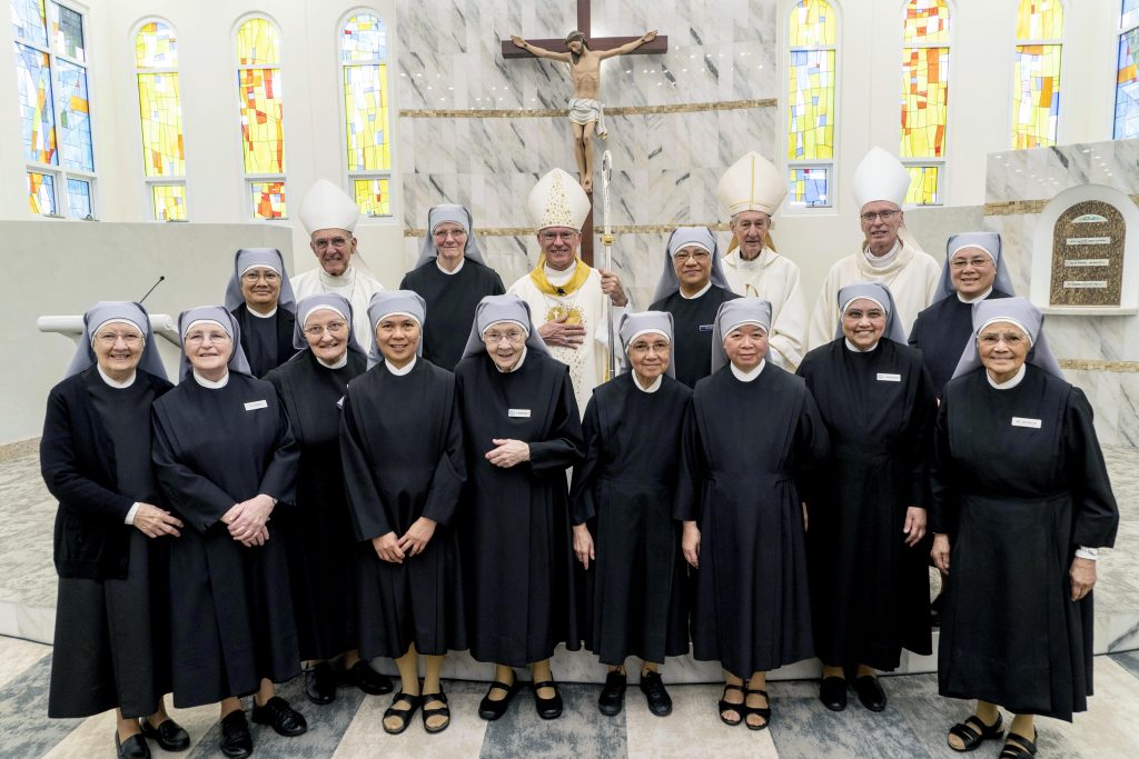 Emeritus Bishop Justin Bianchini, Mother Provincial Sr Ann Marie James, Archbishop Timothy Costelloe, Emeritus Archbishop Barry Hickey, Auxiliary Bishop Donald Sproxton and the Little Sisters of the Poor, Glendalough, in the new chapel. Photo: Josh Low.