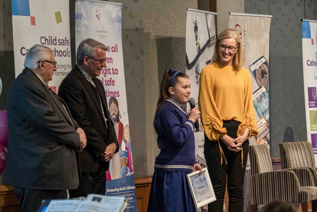 Ivanya Delish received a prize for her entry to the safeguarding competition during the annual Safeguarding Breakfast held on 5 September at Duxton Hotel. Photo: Josh Low.
