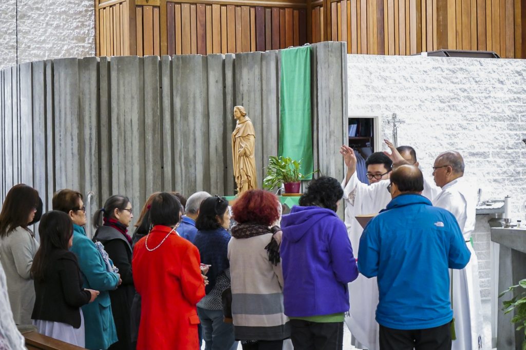 Participants at a St Peregrine Mass come for healing and intercessory prayer. Photo: Supplied.