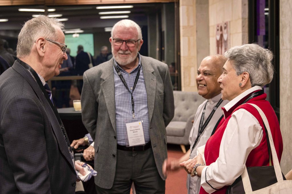 Conference attendees mingle after student representatives of Servite College led the opening prayer on 3 October at the University of Notre Dame Fremantle Campus. Photo: Matthew Lau.