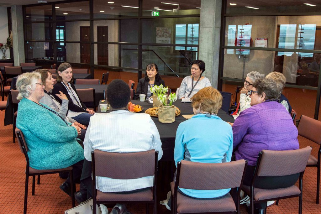 Wives of deacons gather for a workshop session in the Tannock Hall building of UNDA Fremantle. Photo: Matthew Lau.