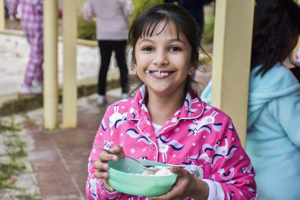 Students held off eating their normal food on Rice Day, given just one bowl of rice – globally considered as the day’s full feed. Photo: Supplied.
