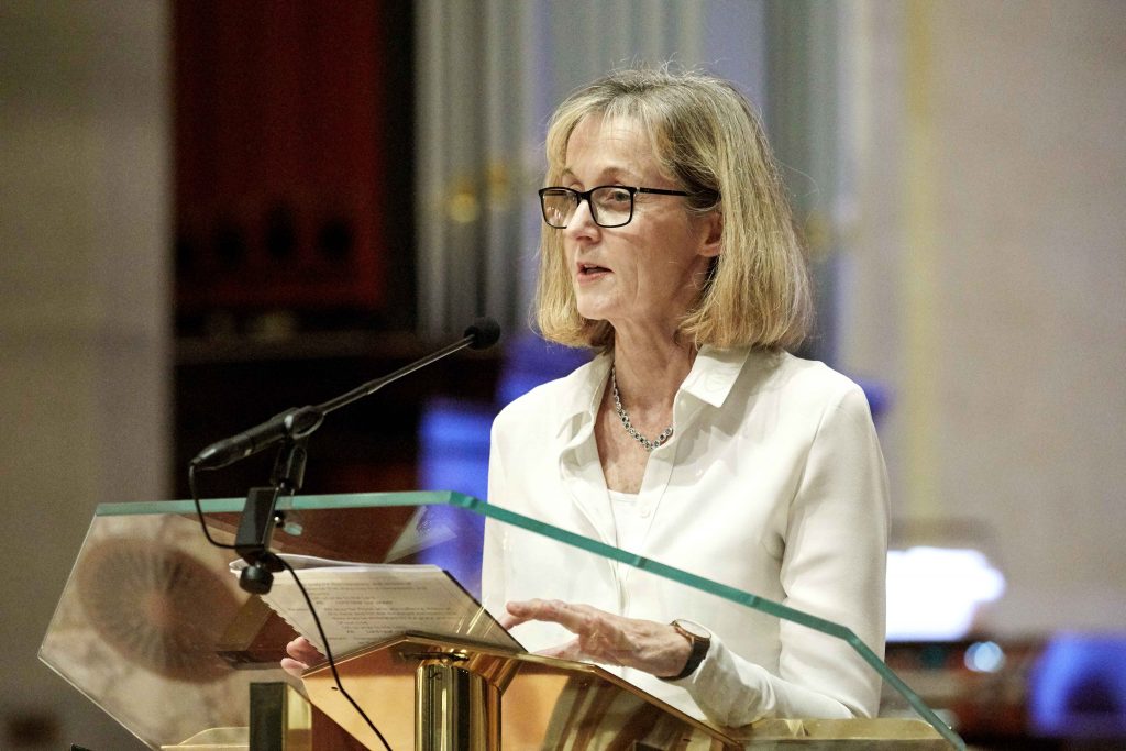 SVDP CEO Susan Rooney delivers one of the readings during the Mass at St Mary’s. Photo: Ron Tan.